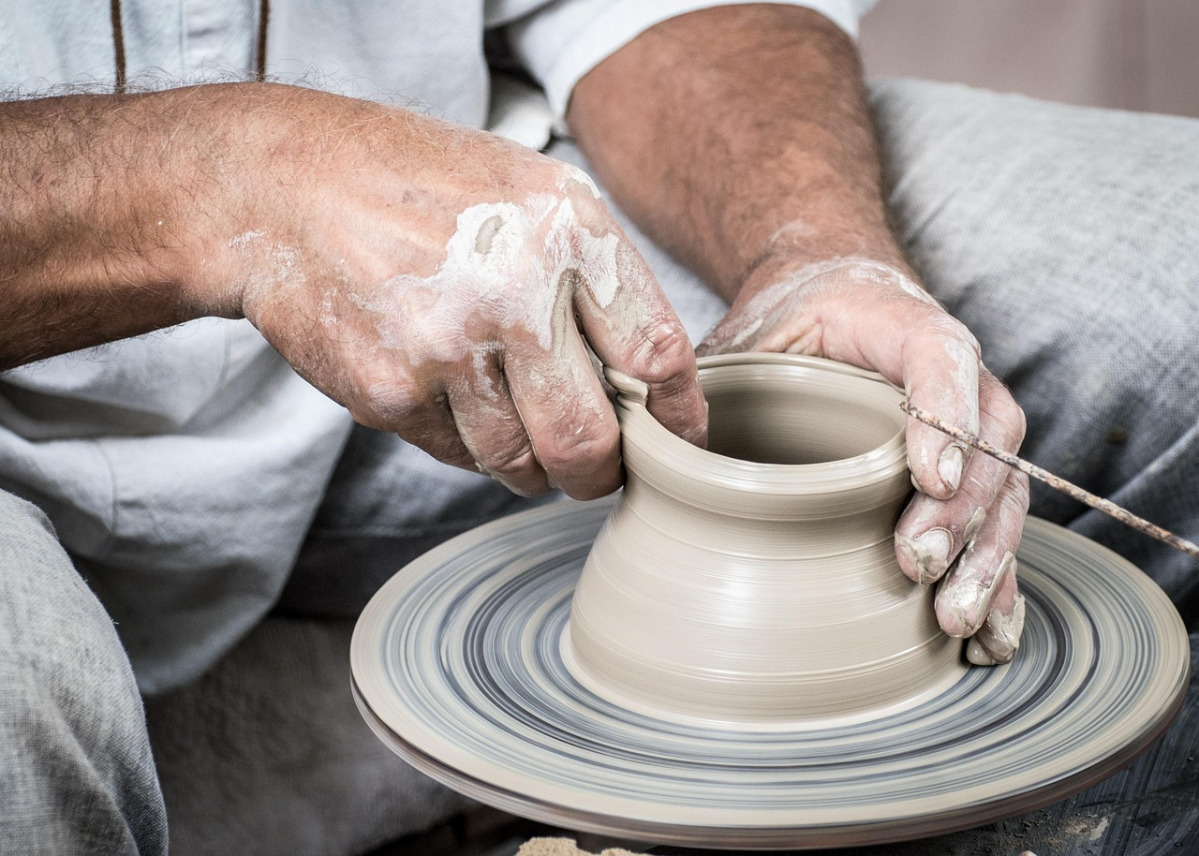 pottery wheel hands clay